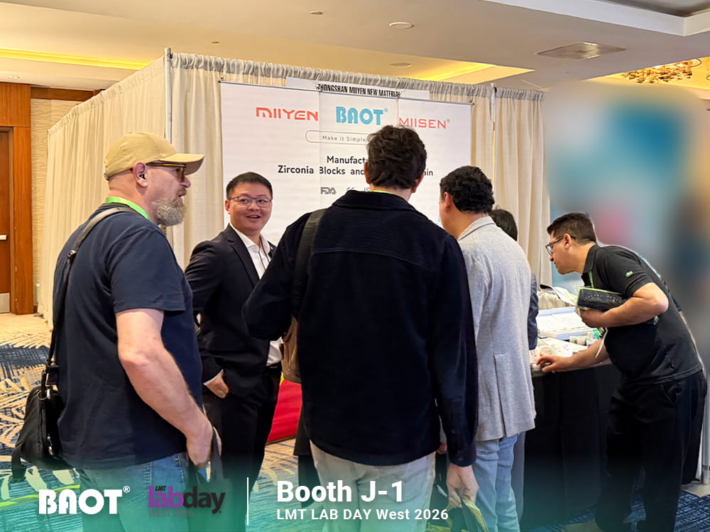 Visitors exploring BAOT dental materials at Booth J-1